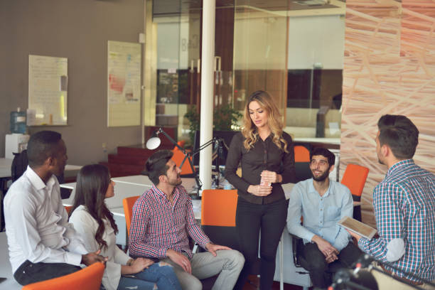 istock young people group in modern office have team meeting and brainstorming while working on laptop and drinking coffee 865951530