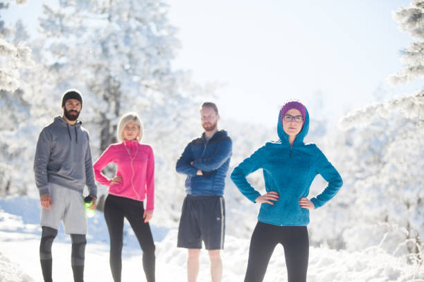 istock Four sportspeople on mountain 865952042