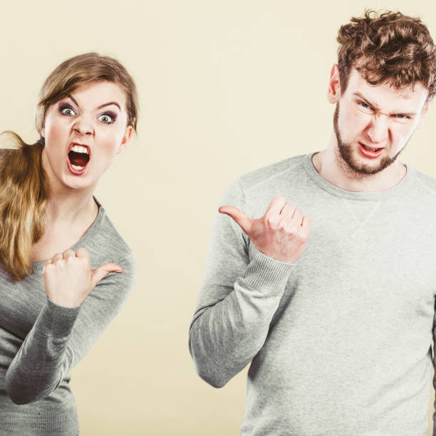 istock Young emotional couple arguing. 865956024