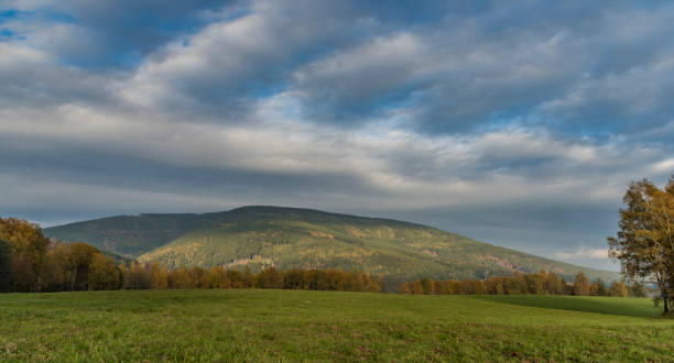 istock Cerna hill and autumn evening in Krkonose mountains 865958580