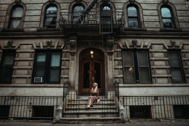 A beautiful young woman from Bangladesh spends some leisure time exploring New York city.  She wears a hijab and traditional clothing.