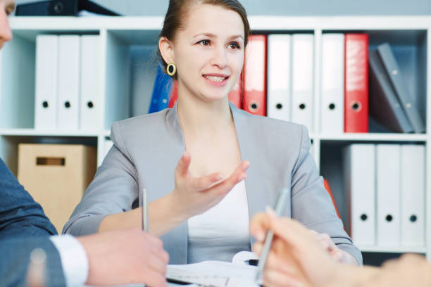 istock Modern lawyers discussing working problems. Serious business and partnership, job offer, financial success concept 865967184