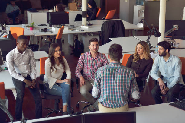 istock young people group in modern office have team meeting and brainstorming while working on laptop and drinking coffee 865967658