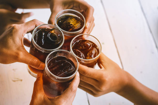 party people drinking soft drink,beverage, black water,for party,meeting,with fun and happy. soda pop stock pictures, royalty-free photos & images