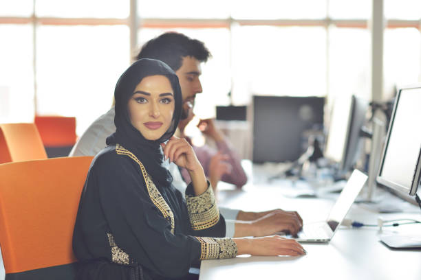 istock Multiracial contemporary business people working connected with technological devices like tablet and laptop 865982200