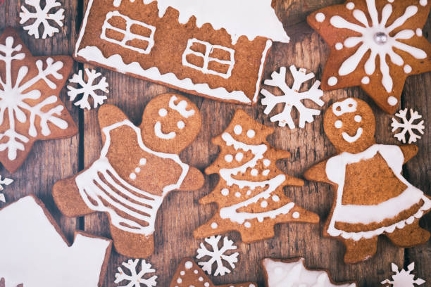 istock Christmas homemade gingerbread cookies on rustic wooden table 865987376
