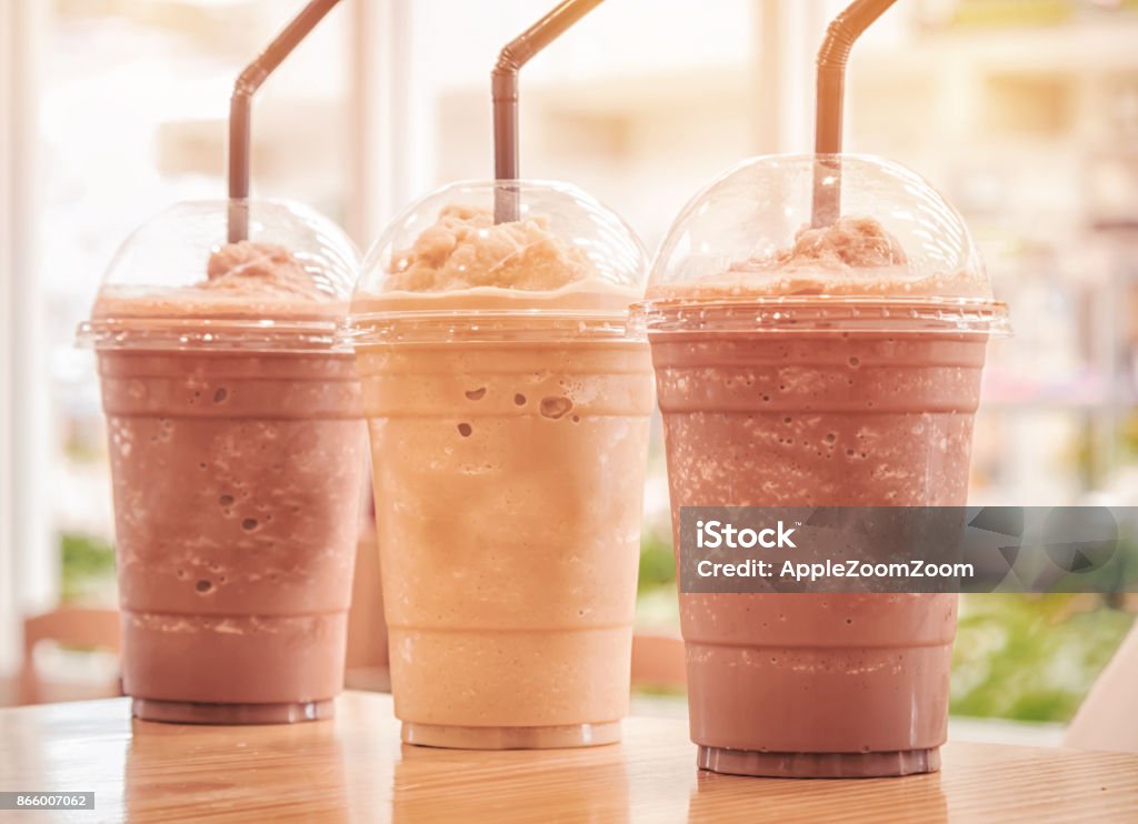 Chocolate Frappe and Frappuccino on wood table Coffee Frappe Stock Photo
