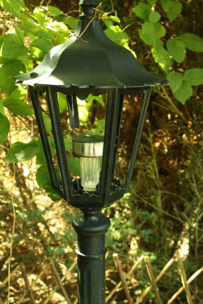 istock Garden lamp post  Rechargeable light bulb with solar energy 866007656