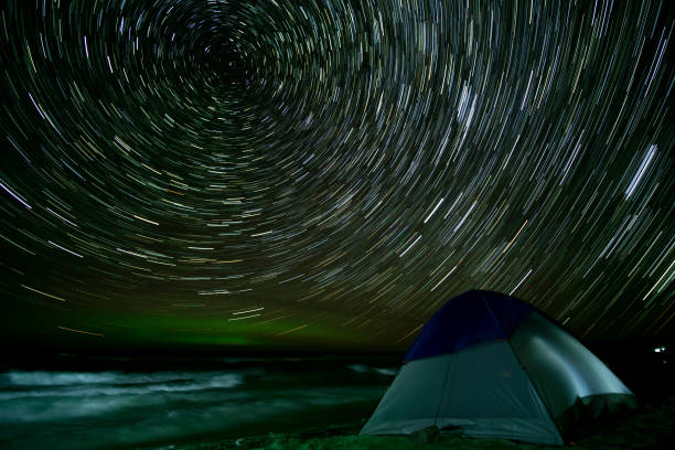 istock Aurora Borealis Star Trail Lake Superior Beach Tent 866007730
