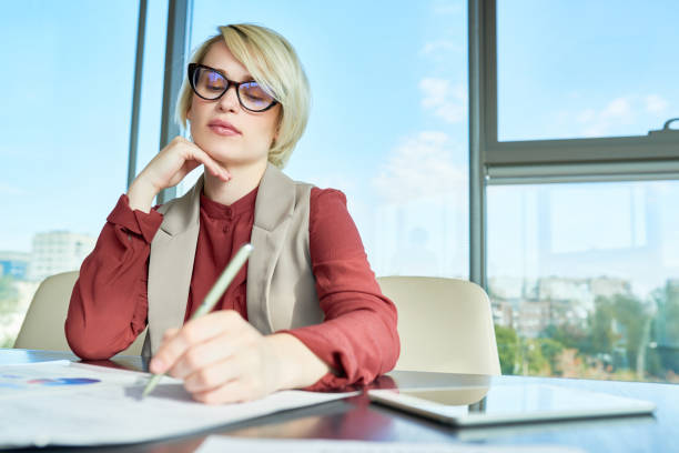 istock Pretty Businesswoman Focused on Work 866009898
