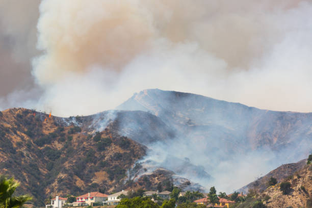 istock La Tuna wildfire in Los Angeles, CA burning a structure 866009978