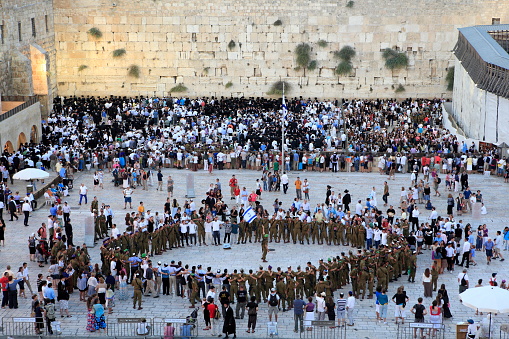 Jerusalem, Israel - Aug 20, 2010:  Jewish people singing and dancing in the Wailing Wall square of Jerusalem old city to celebrate the Sabbath, on Aug 20, 2010.