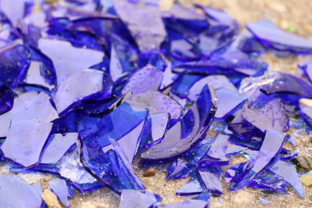 istock blue broken glass on a concrete surface - texture for a background, design 866021618