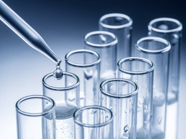 istock Different laboratory beakers and glassware. Monochrome. 866028138