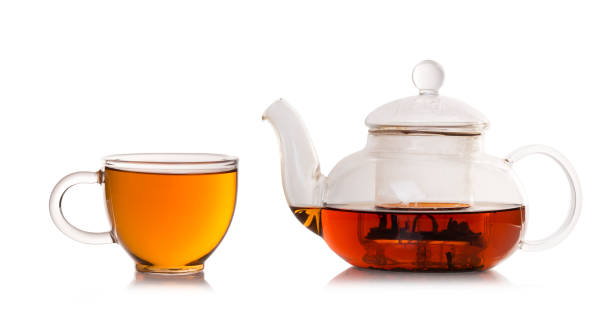 istock Tea in cup and teapot on white background. 866031220