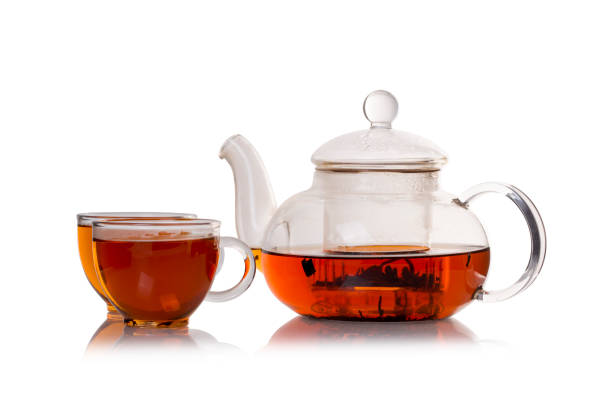 istock Tea in cup and teapot on white background. 866031266