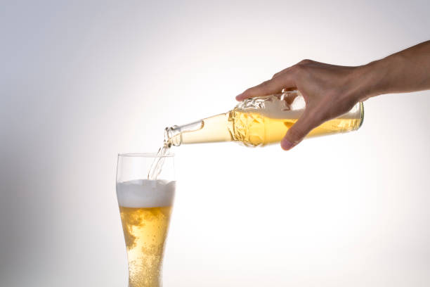 istock Pouring beer into a glass. 866031352