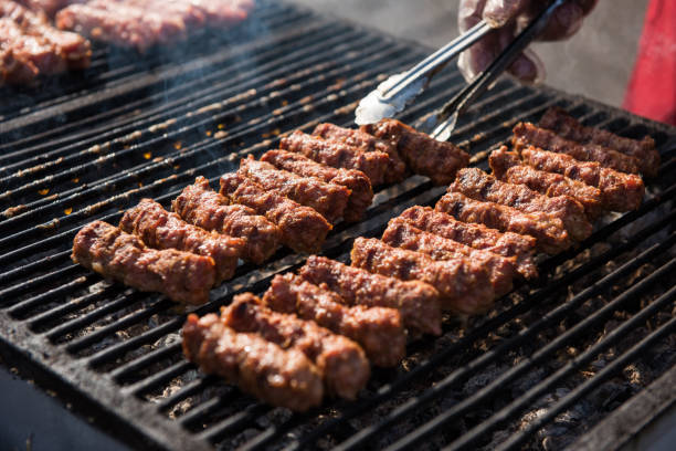 istock Romanian food, grilled meat rolls called mititei or mici 866032024