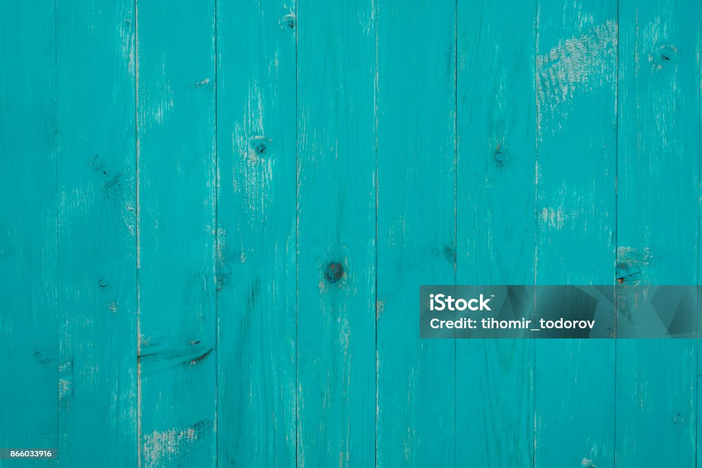 Turquoise colored wooden background - vertical boards Beautiful turquoise colored wooden background with vertical boards. Paint Stock Photo