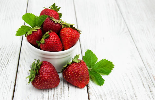 istock ripe strawberries on wooden table 866035138