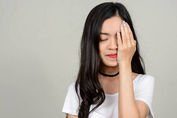 istock Young beautiful Asian woman against white background 866040146