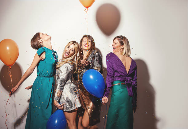 istock Group of girls having a party 866044098