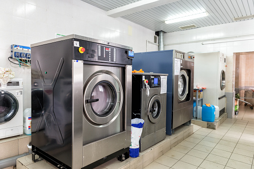 Automatic washing machines at laundry service