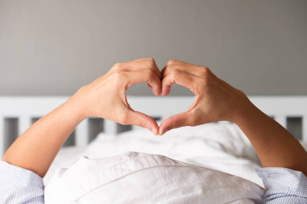 istock Woman is showing a gesture by hand in heart shape 866046712