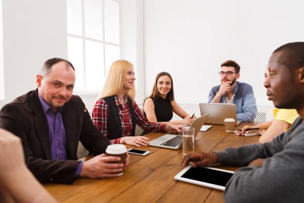 istock Business meeting. Young team in modern office 866047422