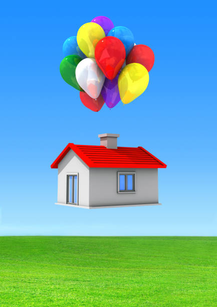 istock Balloons house on a green lawn 866048452