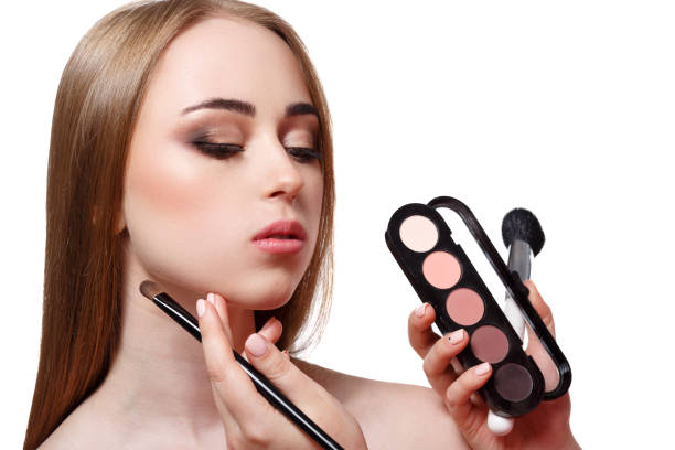 istock Backstage, fashion shooting, make-up, isolated on white 866048504