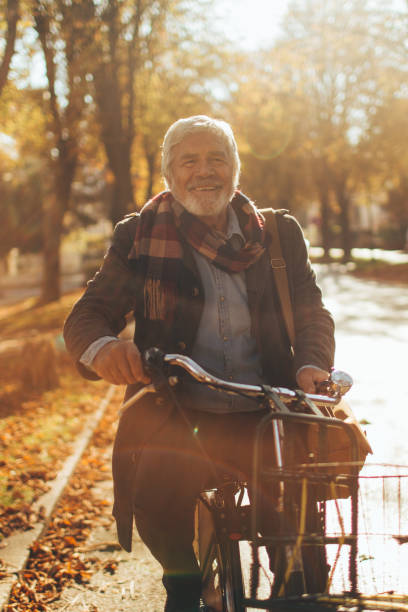 istock Stylish, senior man on a bicycle 866051928