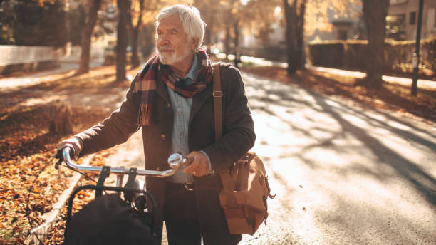 istock Stylish, senior man on a bicycle 866051932