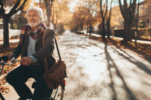 istock Fashionable senior man on a bicycle 866052276