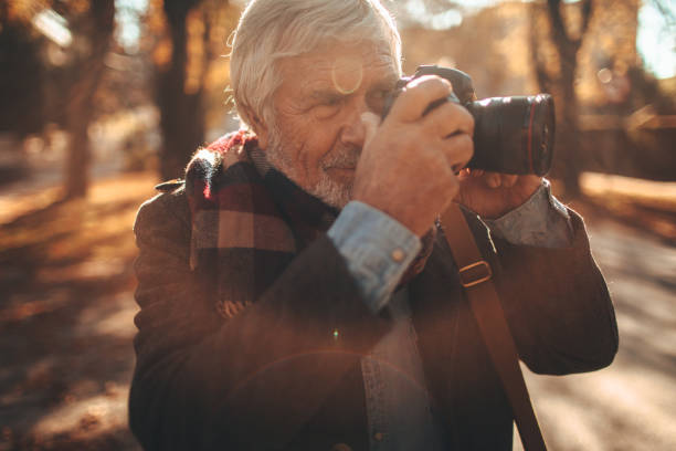 istock Fashionable senior photographer 866052716