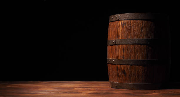 istock Rustic wooden barrel on a night background 866052990