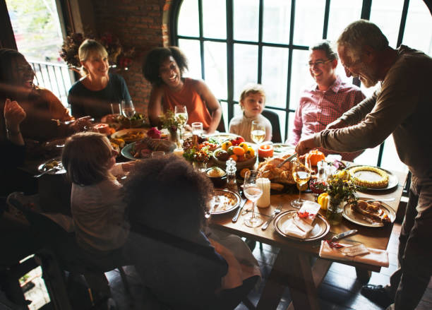 istock People are celebrating Thanksgiving day 866054020