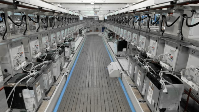 TIME-LAPSE Products moving on a rail in the factory