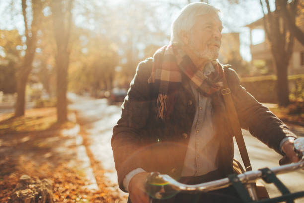 istock Fashionable senior man on a bicycle 866058908