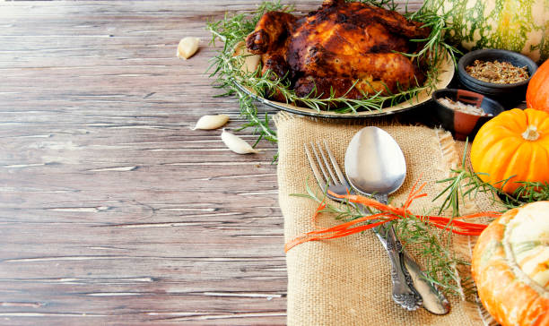 istock Seasonal wooden table setting with small pumpkins 866059386