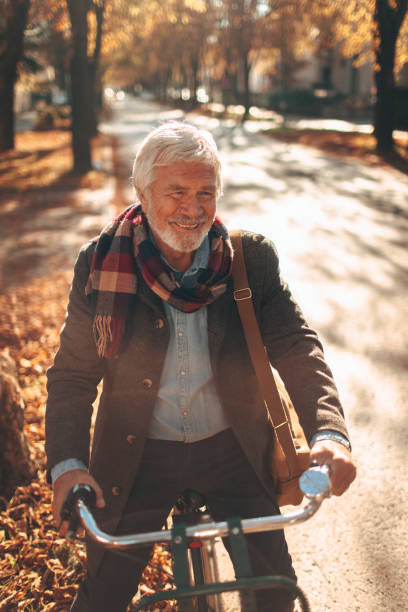 istock Fashionable senior man on a bicycle 866059496