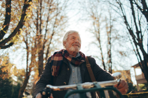 istock Fashionable senior man on a bicycle 866059502