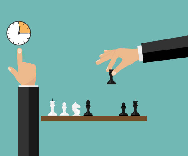 istock Game of chess. The hand rearranges the chess piece. 866060830