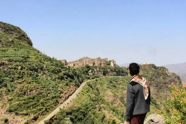 A young man from Yemen when he was watching the historical place in sana.