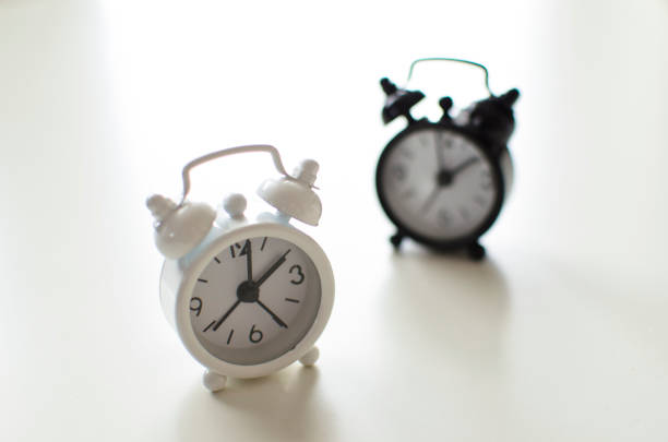 istock Alarm clock friends situation 866061438