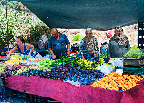 Bodrum, Turkey - August 15, 2017: people who shop on the street market in Bodrum Turkey.