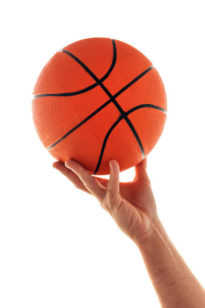 istock Male hand with basketball 866069518