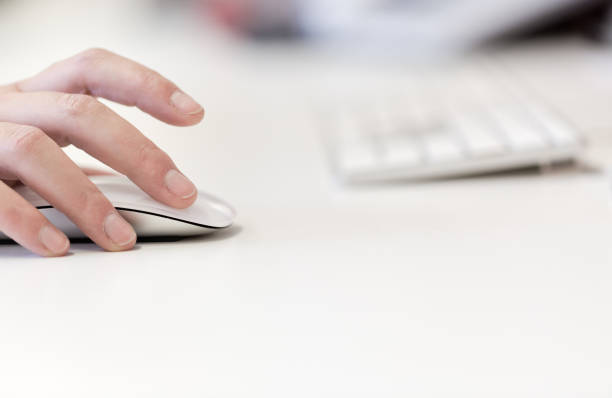 istock Young adult woman works on computer using wireless modern 866077712
