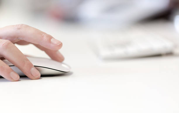 istock Young adult woman works on computer using wireless modern 866077738