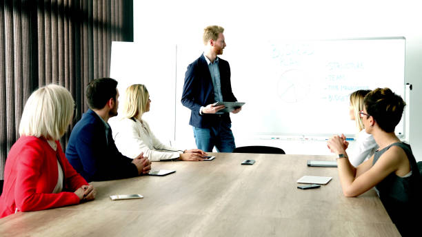 istock Business man presenting new ideas and projects to his team 866080070